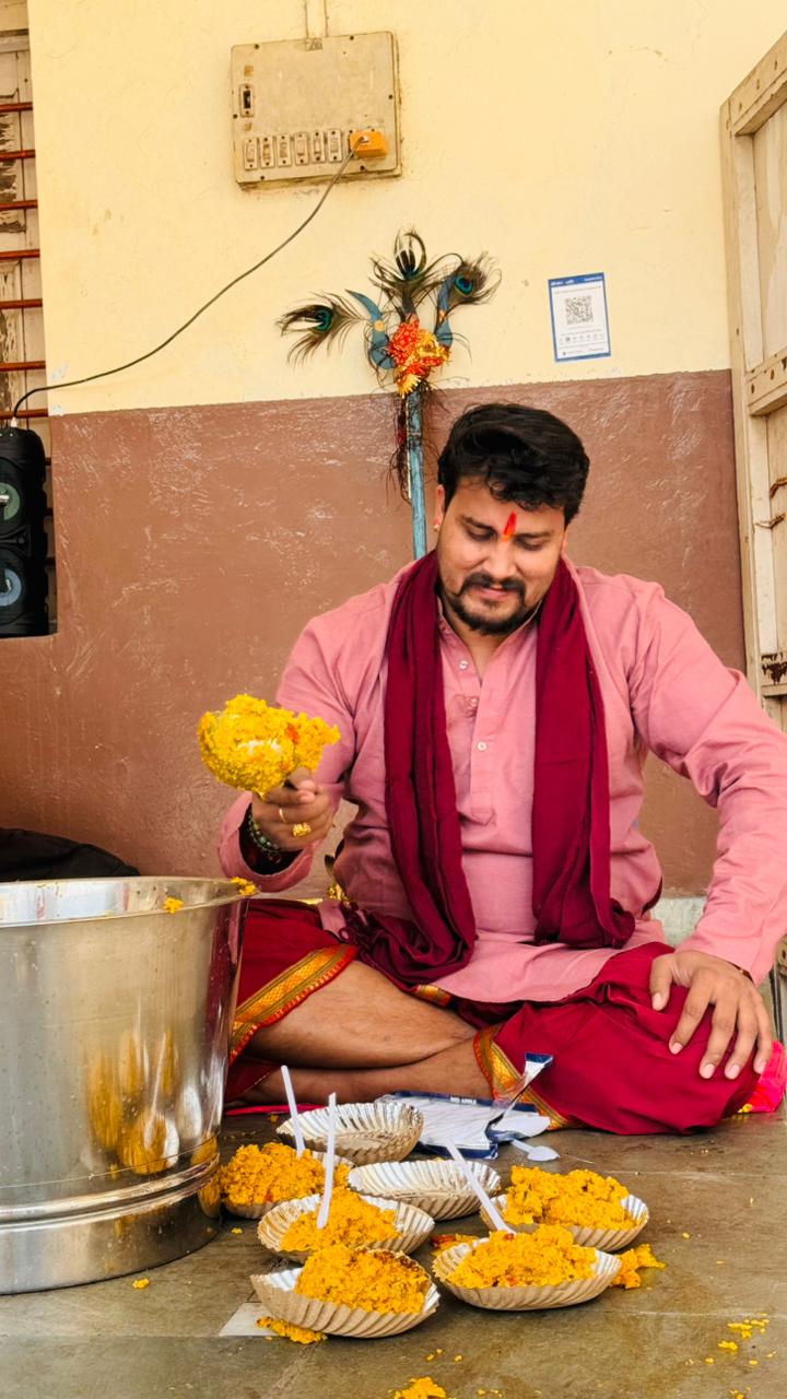 Preparing prasad plates at the temple entrance